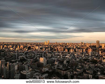 Dramatic sky over Tokyo cityscape before sunset, Tokyo, Japan View Large Photo Image Stock Image - Dramatic sky over Tokyo cityscape before sunset, Tokyo, Japan. Fotosearch