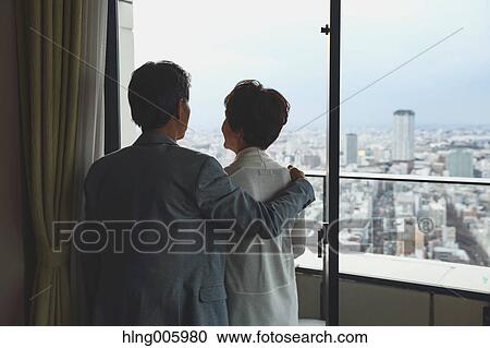 Fashionable Japanese senior couple by the window View Large Photo Image Stock Image - Fashionable Japanese senior couple by the window. Fotosearch