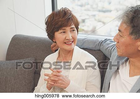 Fashionable Japanese senior couple on the sofa View Large Photo Image Stock Photo - Fashionable Japanese senior couple on the sofa. Fotosearch