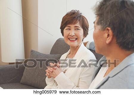 Fashionable Japanese senior couple on the sofa View Large Photo Image Stock Photo - Fashionable Japanese senior couple on the sofa. Fotosearch