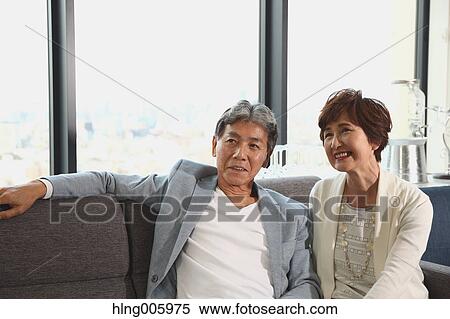 Fashionable Japanese senior couple on the sofa View Large Photo Image Stock Photography - Fashionable Japanese senior couple on the sofa. Fotosearch