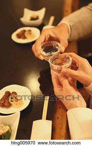 Fashionable Japanese senior couple having a good time at the restaurant View Large Photo Image Stock Image - Fashionable Japanese senior couple having a good time at the restaurant. Fotosearch