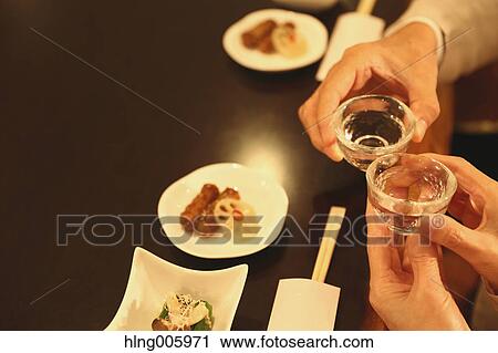 Fashionable Japanese senior couple having a good time at the restaurant View Large Photo Image Stock Image - Fashionable Japanese senior couple having a good time at the restaurant. Fotosearch