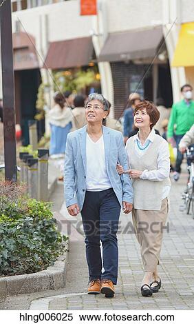 Fashionable Japanese senior couple walking downtown Tokyo View Large Photo Image Stock Photography - Fashionable Japanese senior couple walking downtown Tokyo. Fotosearch
