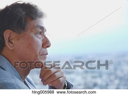 Fashionable Japanese senior man looking at Tokyo cityscape View Large Photo Image Stock Photo - Fashionable Japanese senior man looking at Tokyo cityscape. Fotosearch