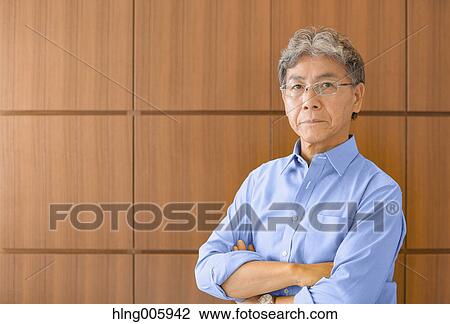 Stock Image - Fashionable Japanese senior man portrait. Fotosearch