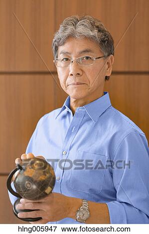 Fashionable Japanese senior man portrait View Large Photo Image Stock Photo - Fashionable Japanese senior man portrait. Fotosearch