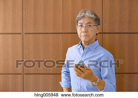 Fashionable Japanese senior man portrait View Large Photo Image Stock Photo - Fashionable Japanese senior man portrait. Fotosearch