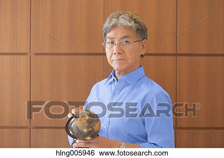 Fashionable Japanese senior man portrait View Large Photo Image Stock Photograph - Fashionable Japanese senior man portrait. Fotosearch