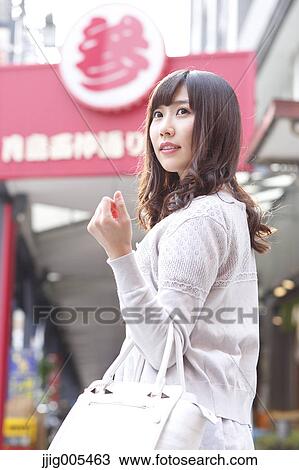 Fashionable Japanese woman at a traditional shopping street, Tokyo, Japan View Large Photo Image Stock Image - Fashionable Japanese woman at a traditional shopping street, Tokyo, Japan. Fotosearch