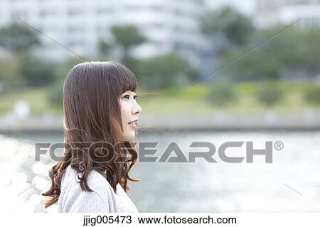Fashionable Japanese woman by the river, Tokyo, Japan View Large Photo Image Stock Image - Fashionable Japanese woman by the river, Tokyo, Japan. Fotosearch