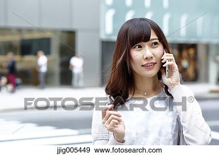 Fashionable Japanese woman on the phone in luxury Tokyo area, Tokyo, Japan View Large Photo Image Stock Photo - Fashionable Japanese woman on the phone in luxury Tokyo area, Tokyo, Japan. Fotosearch