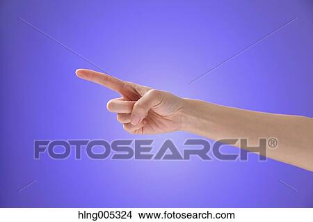 Picture - Female hand performing touch gesture. Fotosearch