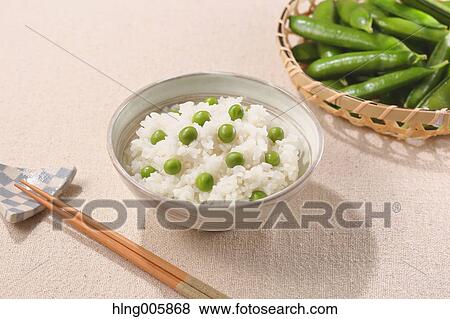 Green peas topped rice View Large Photo Image Stock Photo - Green peas topped rice. Fotosearch