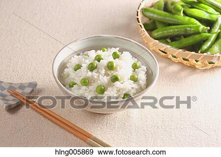 Green peas topped rice View Large Photo Image Stock Photo - Green peas topped rice. Fotosearch