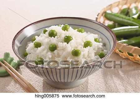 Stock Photography - Green peas topped rice. Fotosearch
