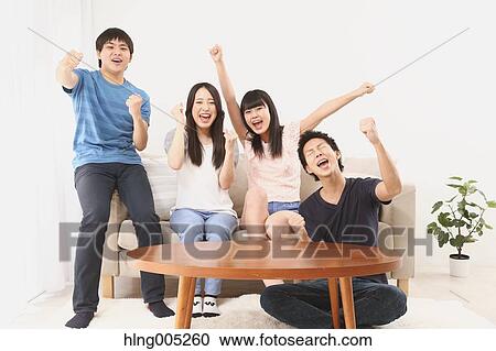 Group of Japanese supporters in the living room View Large Photo Image Stock Image - Group of Japanese supporters in the living room. Fotosearch