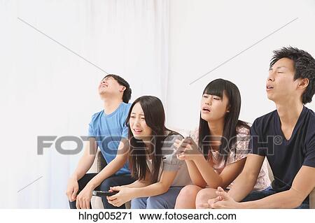 Group of Japanese supporters in the living room View Large Photo Image Stock Image - Group of Japanese supporters in the living room. Fotosearch