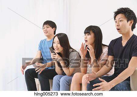 Group of Japanese supporters in the living room View Large Photo Image Stock Image - Group of Japanese supporters in the living room. Fotosearch