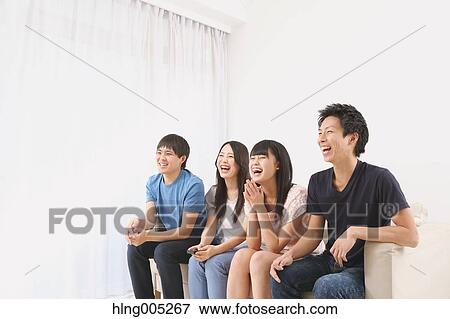 Group of Japanese supporters in the living room View Large Photo Image Stock Photo - Group of Japanese supporters in the living room. Fotosearch