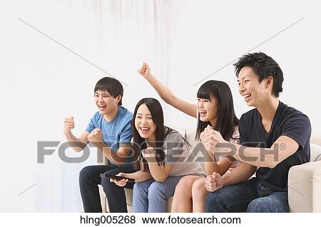 Group of Japanese supporters in the living room View Large Photo Image Stock Photo - Group of Japanese supporters in the living room. Fotosearch
