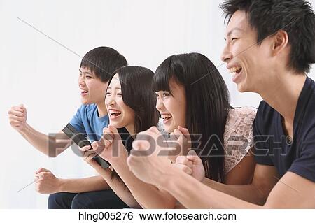 Group of Japanese supporters in the living room View Large Photo Image Stock Photograph - Group of Japanese supporters in the living room. Fotosearch