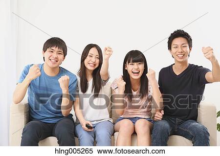 Group of Japanese supporters in the living room View Large Photo Image Stock Photography - Group of Japanese supporters in the living room. Fotosearch