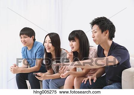 Group of Japanese supporters in the living room View Large Photo Image Stock Photography - Group of Japanese supporters in the living room. Fotosearch