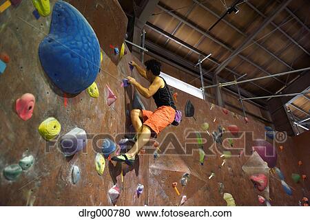 Japanese bouldering athlete in action View Large Photo Image Stock Image - Japanese bouldering athlete in action. Fotosearch