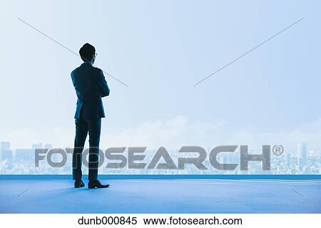Japanese businessman in a modern office View Large Photo Image Stock Photography - Japanese businessman in a modern office. Fotosearch
