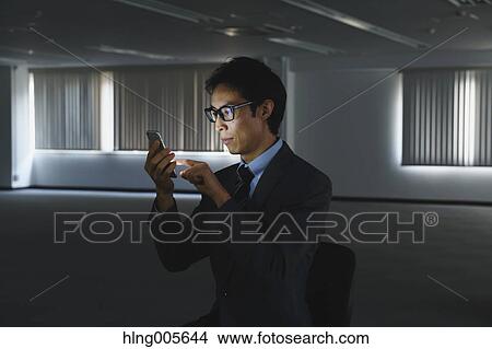 Japanese businessman in empty office View Large Photo Image Picture - Japanese businessman in empty office. Fotosearch