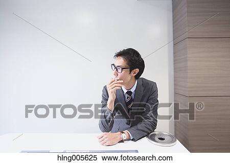 Japanese businessman in smoking room View Large Photo Image Stock Photography - Japanese businessman in smoking room. Fotosearch