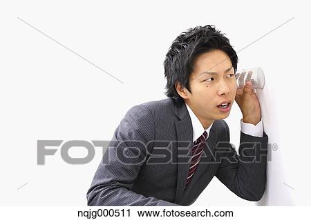Stock Image - Japanese businessman on white background. Fotosearch