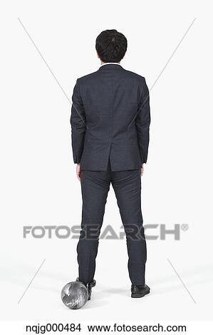Japanese businessman with ball and chain View Large Photo Image Picture - Japanese businessman with ball and chain. Fotosearch