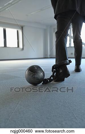 Japanese businessman with ball and chain View Large Photo Image Stock Image - Japanese businessman with ball and chain. Fotosearch