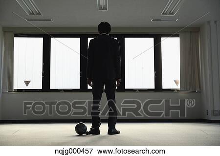 Japanese businessman with ball and chain View Large Photo Image Stock Photo - Japanese businessman with ball and chain. Fotosearch