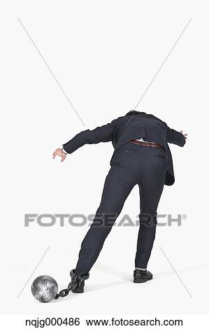 Japanese businessman with ball and chain View Large Photo Image Stock Photograph - Japanese businessman with ball and chain. Fotosearch