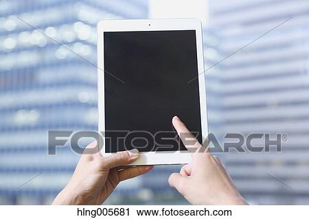 Japanese businessman with tablet View Large Photo Image Stock Image - Japanese businessman with tablet. Fotosearch