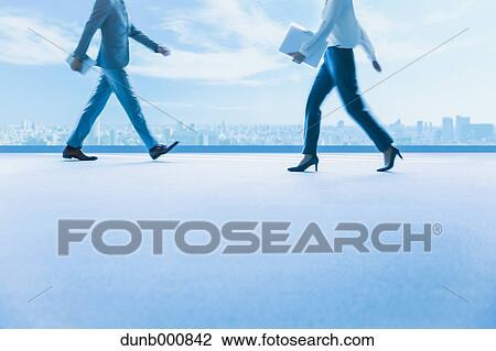 Japanese businesspeople in a modern office View Large Photo Image Stock Image - Japanese businesspeople in a modern office. Fotosearch