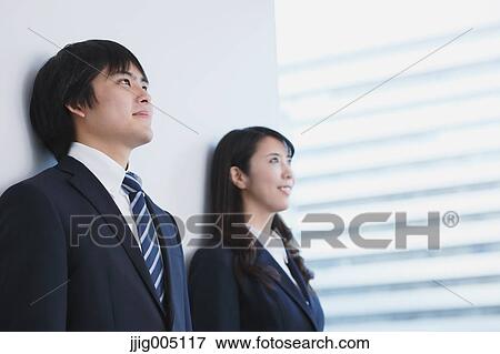 Japanese businesspeople in a modern office View Large Photo Image Stock Photo - Japanese businesspeople in a modern office. Fotosearch