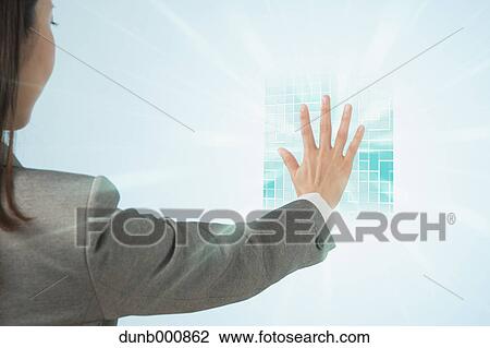 Japanese businesswoman interacting with virtual reality View Large Photo Image Stock Image - Japanese businesswoman interacting with virtual reality. Fotosearch
