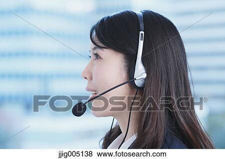 Japanese call center operator View Large Photo Image Stock Photo - Japanese call center operator. Fotosearch