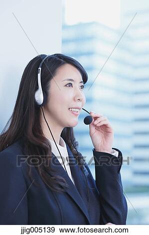 Japanese call center operator View Large Photo Image Stock Photo - Japanese call center operator. Fotosearch