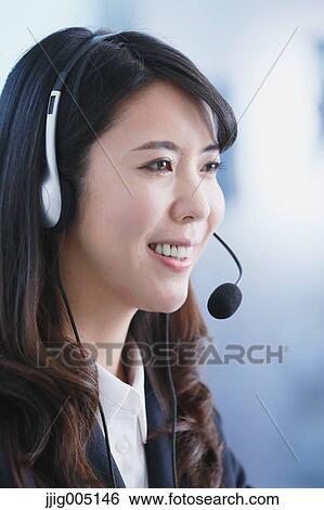 Japanese call center operator View Large Photo Image Stock Photograph - Japanese call center operator. Fotosearch