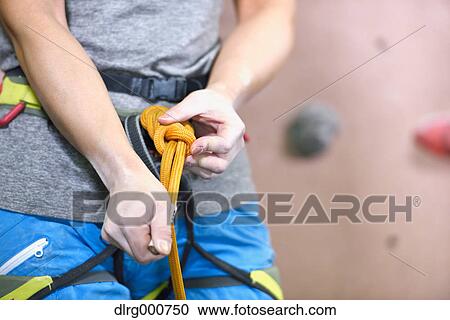 Japanese climbing athlete getting ready to climb gym wall View Large Photo Image Stock Image - Japanese climbing athlete getting ready to climb gym wall. Fotosearch
