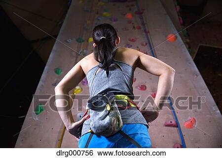 Japanese climbing athlete getting ready to climb gym wall View Large Photo Image Stock Photograph - Japanese climbing athlete getting ready to climb gym wall. Fotosearch