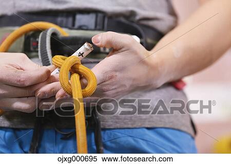 Japanese climbing athlete getting ready to climb gym wall View Large Photo Image Stock Photography - Japanese climbing athlete getting ready to climb gym wall. Fotosearch