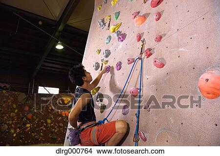 Japanese climbing athlete in action View Large Photo Image Picture - Japanese climbing athlete in action. Fotosearch