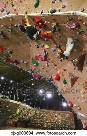 Japanese climbing athlete in action View Large Photo Image Picture - Japanese climbing athlete in action. Fotosearch