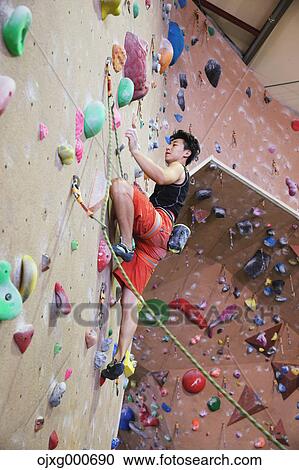 Japanese climbing athlete in action View Large Photo Image Stock Image - Japanese climbing athlete in action. Fotosearch